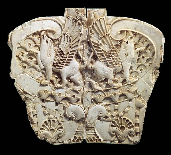 Plaque depicting two winged Griffons and a lotus plant, Nimrud, Mesopotamia