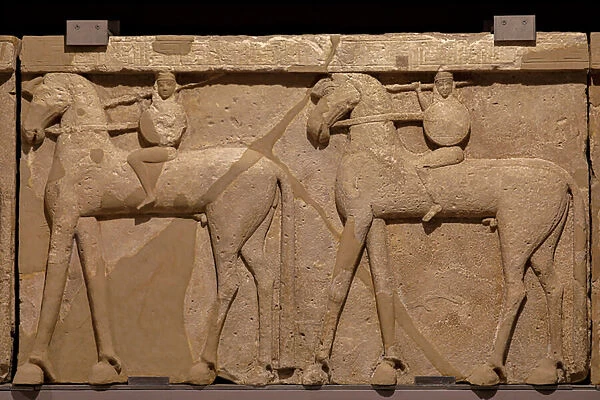 Poros stone Frieze depicting a procession of horsemen. 7th century BC