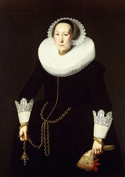 Portrait of a Lady, standing three quarter length, wearing an Elaborate Black Costume