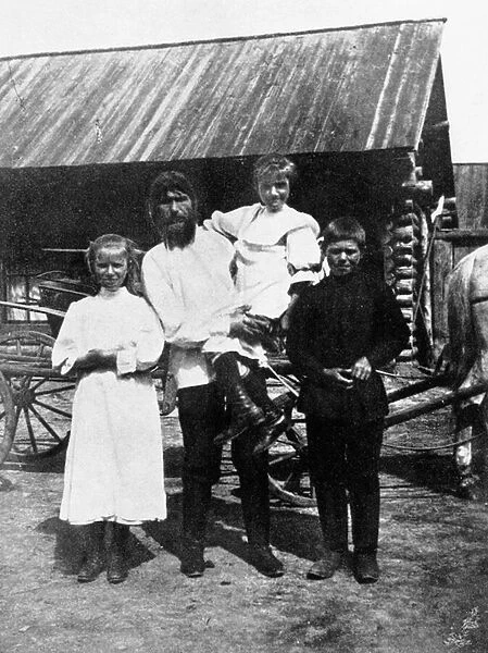 Rasputin and his family at Pokrovskoe (b  /  w photo)