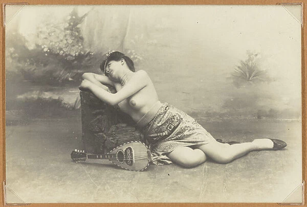 Reclining woman with mandolin, c. 1895 (gelatin silver print)