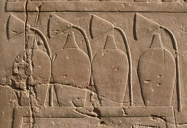 Detail of a relief depicting jars and lotus flowers (limestone)
