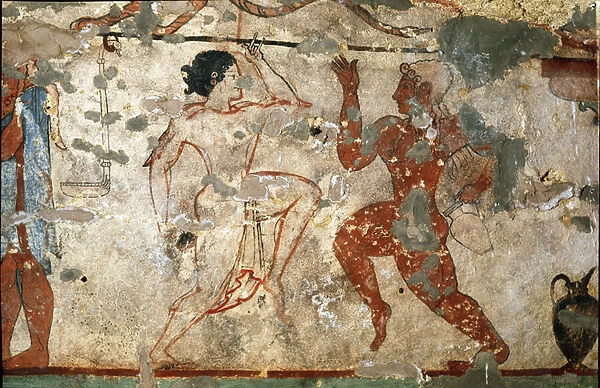 Ritual dance, young woman wearing a transparent tunic and young man naked