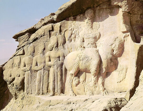 Rock relief depicting Shapur I (AD 241-272) and his family wearing heraldic emblems on their hats