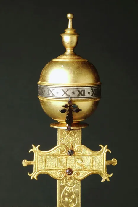 Framed Print : Rotating sphere that indicates hours, detail of crucifix-shaped gilt brass clock, with cast moulded figures, rocker arm mechanism on which is mounted spring-loaded cam mechanism known as stackfreed, Germany, end 16th century Framed Print : Rotating sphere that indicates hours, detail of crucifix-shaped gilt brass clock, with cast moulded figures, rocker arm mechanism on which is mounted spring-loaded cam mechanism known as stackfreed, Germany, end 16th century