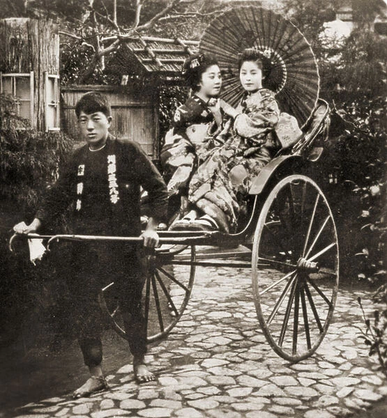 Runner pulling two Geishas on a rickshaw in Japan, c. 1900 (albumen photo)
