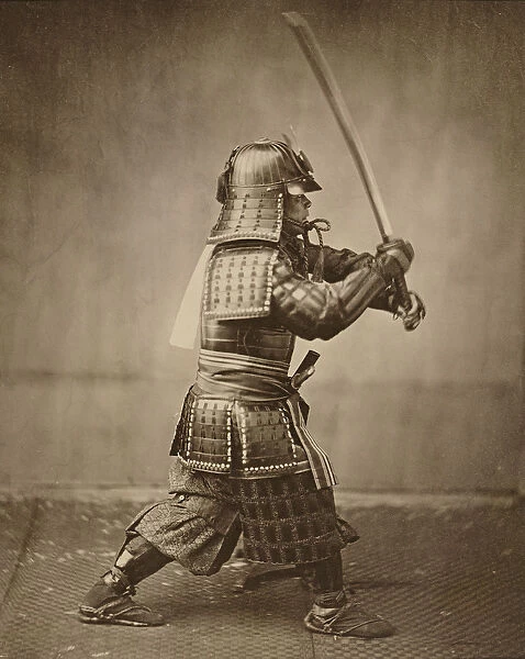 Samurai with raised sword, c. 1860 (albumen print)