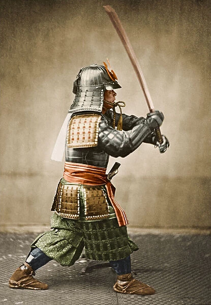 Samurai warrior wearing armour with raised sword, c. 1860 (albumen photograph)