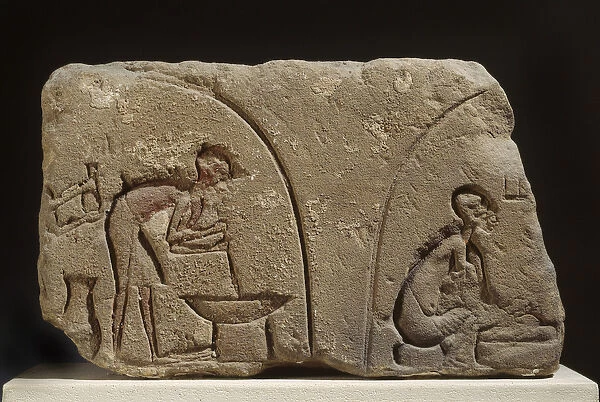 Sandstone relief of preparation of a meal (sandstone)