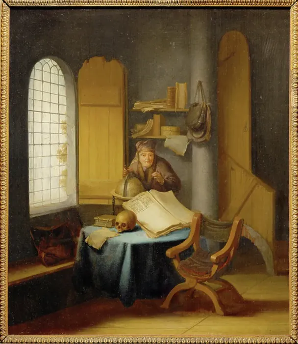 Framed Print : A scholar in his study