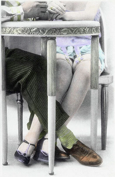 Seduction: the legs of two lovers cross under a table. Postcard from the beginning of the 20th century