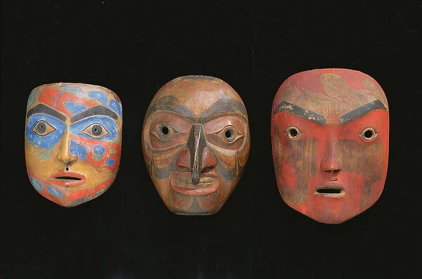 Three shaman masks (painted terracotta)