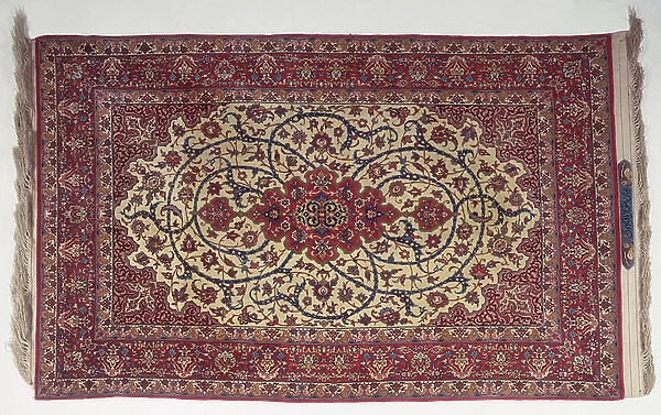 Part silk Isfahan rug with signature cartouche