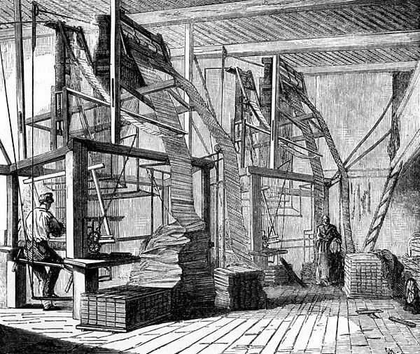 Silkworkers in a workshop in Lyon using a Jacquard loom, c. 1880 (engraving)
