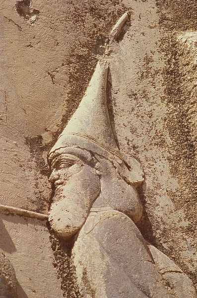 Skunkha, the rebel king, wearing a Scythian hat, detail from Darius Monument