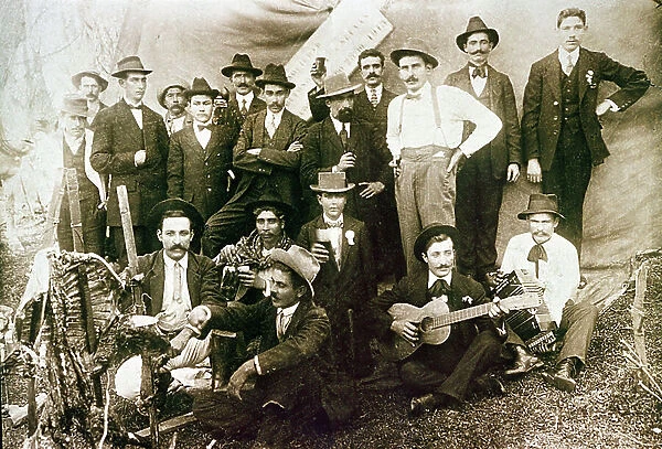 Souvenir photograph at a gypsy party, c.1890 (b / w photo)