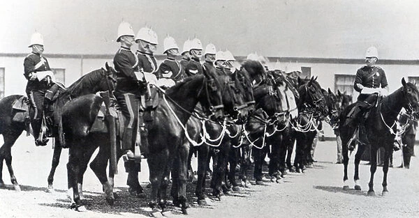 The Squadron of the N. W. Mounted Police in review order (b  /  w photo)