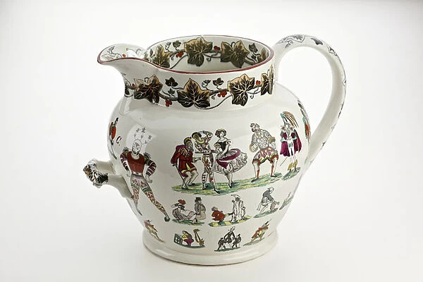Staffordshire jug decorated with Harlequin figures and carnival theme