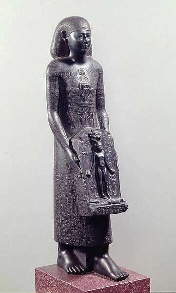 Statue of Padimahes, priest of Bastet, with magical texts for healing, 30th Dynasty or early Ptolemaic Period, 380-c. 300 BC (basalt)