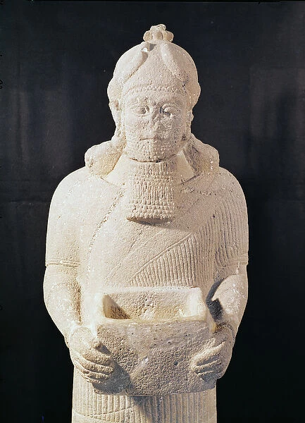 Statuette of a man carrying a box, from Arslan Tach, Syria (stone) (detail)