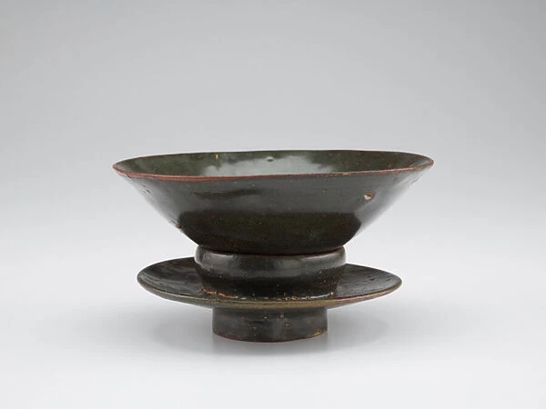 Tea bowl and tea bowl stand, first half of 12th century (stoneware with black slip under celadon glaze)