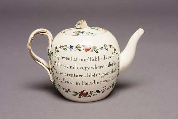 Teapot with Christian inscription, early 19th century (creamware)