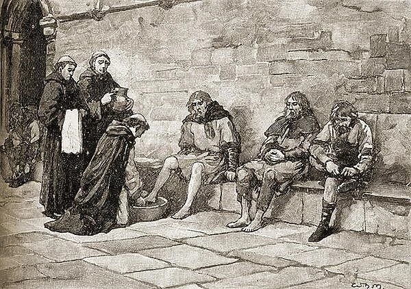 Thomas Becket (c. 1118-70) washing the feet of beggars (engraving)