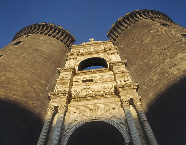 Triumphal arch bearing arms of Aragon and Triumph of Alfonso of Aragon on the exterior of Castelnuovo, completed 1458 (photo)