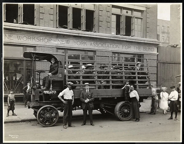 Truckload of blind men ready to depart for a picnic from the Bourne Memorial Building