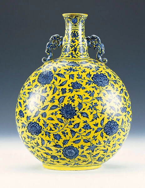 An underglaze blue and yellow enamelled moonflask with a peony and lotus pattern, c