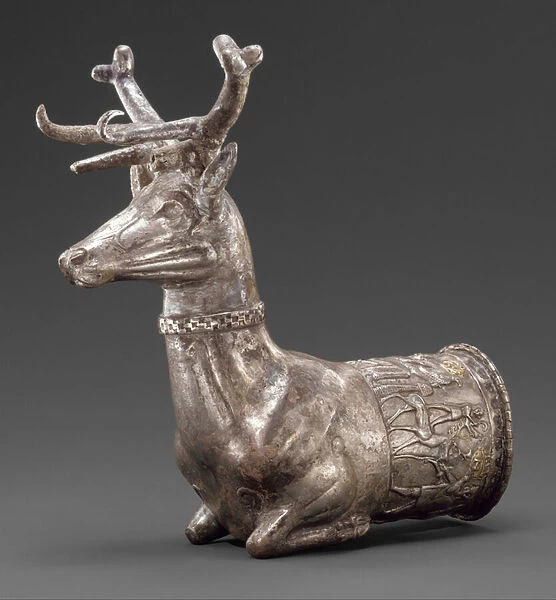 Vessel terminating in the forepart of a stag, c. 1300 BC (silver, gold inlay)