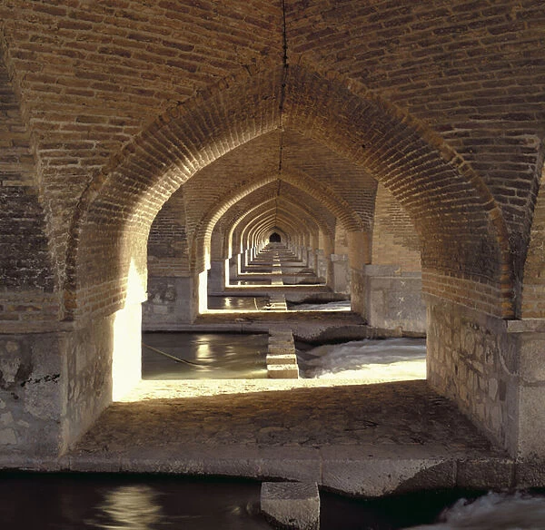 View along the inside of the Khaju Bridge dam, Safavid Period (brick and stone)