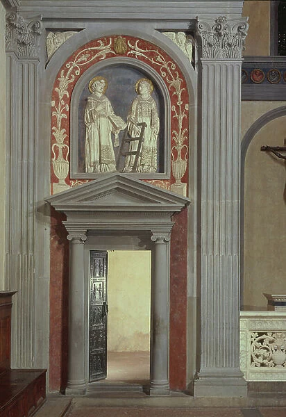 View of the interior showing one set of bronze doors decorated with figures of the Apostles and Martyrs in discussion with a relief of St. Stephen and St. Lawrence above, designed by Filippo Brunelleschi (1377-1446), 1426