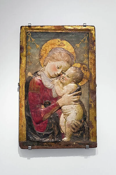 Virgin and child, ca. 1455, (painted and gilded stucco)