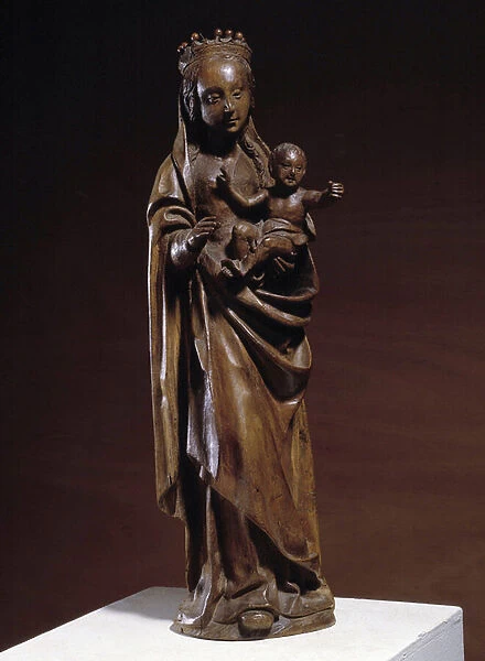 Virgin and Child Wooden sculpture of the 14th century. Made in the North of France