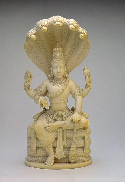 Vishnu, seated on the Serpent Sesha, holding a shell, mace, disc and lotus (ivory)
