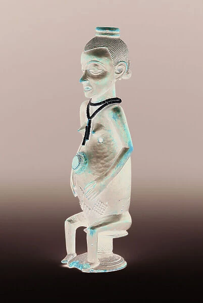 Water pipe in the form of a seated female figure, late 19th or early 20th century (wood, hide, plant fibre & glass beads)