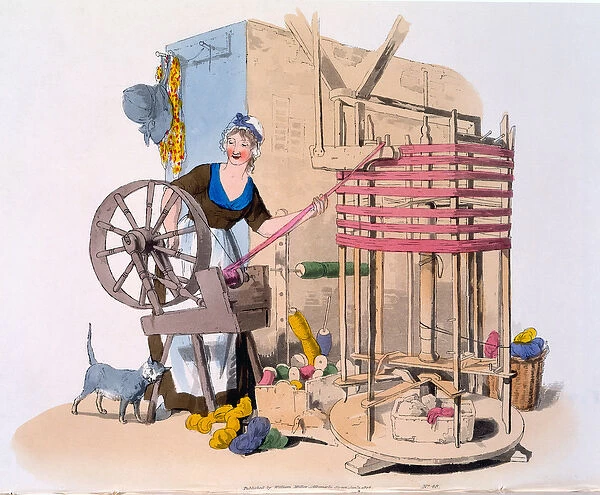 Woman spinning wool onto a rotating machine for making skeins