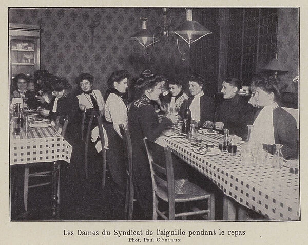 Women members of the Needleworkers Union in Paris during a meal break (b  /  w photo)