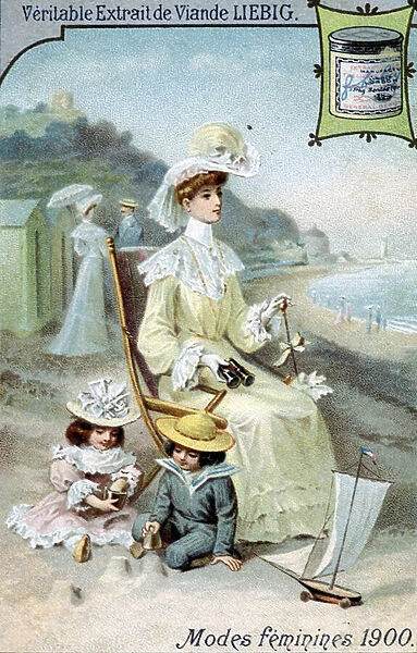 Womens Fashion 1900. Woman on the beach with her two children