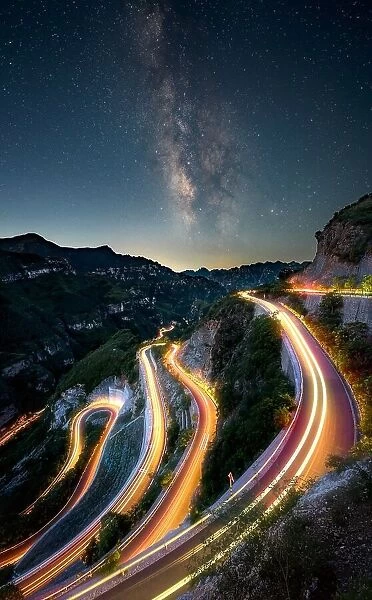 A mountain road under the Milky way