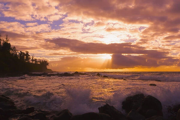 Sunrise And Waves Crashing On The Rocks, Kealia Beach; Kauai, Hawaii, United States Of America