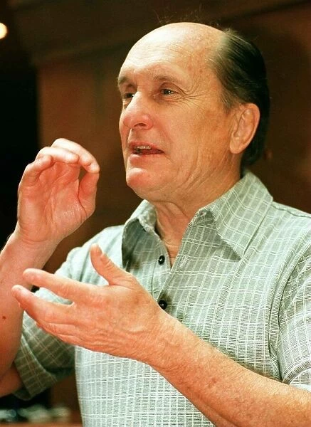 Actor Robert Duvall in Glasgow May 1998 pretending to drink cup of tea