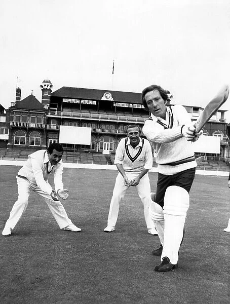 Andys very Handy with the Bat: American singer Andy Williams as he gets his first