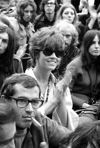 Jane Fonda and Roger Vadim applauding The Who at The Isle of Wight Festival