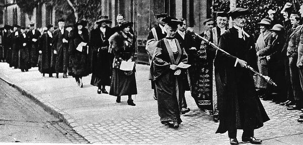 Lord Curzon Chancellor walking with the Queen after she graduated from Oxford with