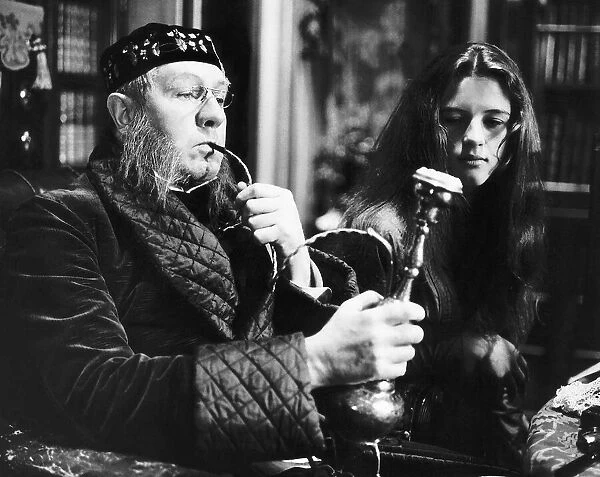 Michael Redgrave actor as the Caterpillar and Anne-Marie Malik as Alice in scene filmed