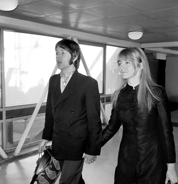 Paul McCartney of the Beatles and Jane Asher at Heathrow today