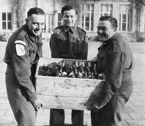 Soldiers carrying beer in Belgium during the Christmas festive period