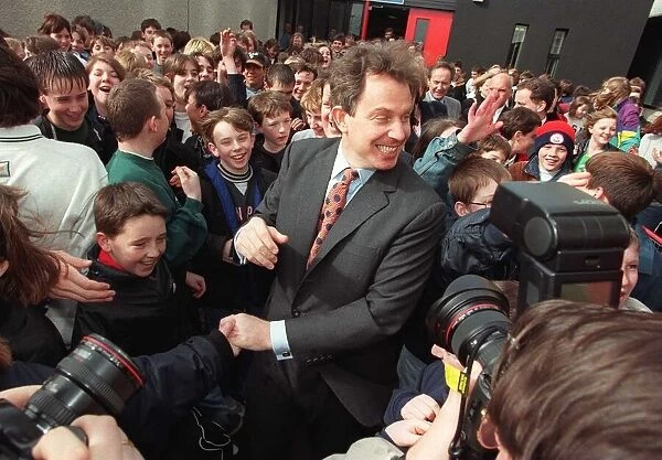 Tony Blair Labour leader mobbed by pupils of Dyce Academy Aberdeen. 1990s